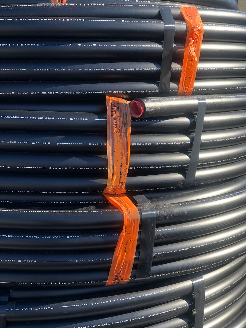 1.25" X 200' X 250/200# BLACK POLY PIPE - 28" COIL